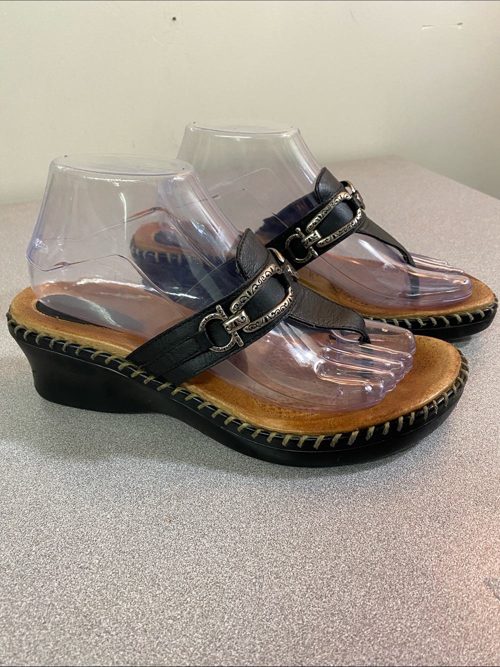 Minnetonka Black Leather Thong Sandals with Metallic Accents